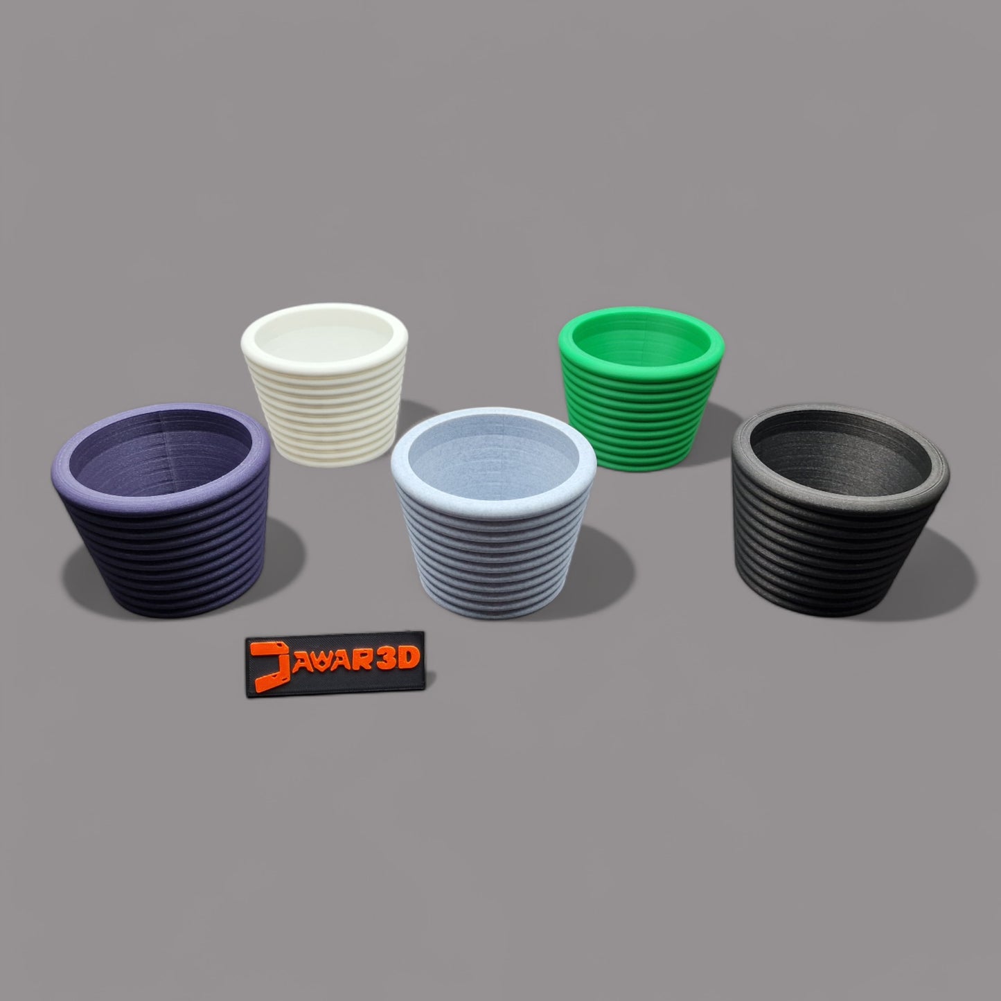 A modern 3D-printed plant pot made from eco-friendly PLA with a minimalist design. Perfect for succulents, cacti, or small plants. Lightweight, durable, and decorative, it blends sustainability with style, ideal for home or office décor. Jawar3d