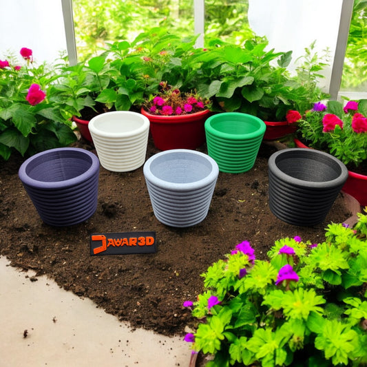 A modern 3D-printed plant pot made from eco-friendly PLA with a minimalist design. Perfect for succulents, cacti, or small plants. Lightweight, durable, and decorative, it blends sustainability with style, ideal for home or office décor. Jawar3d